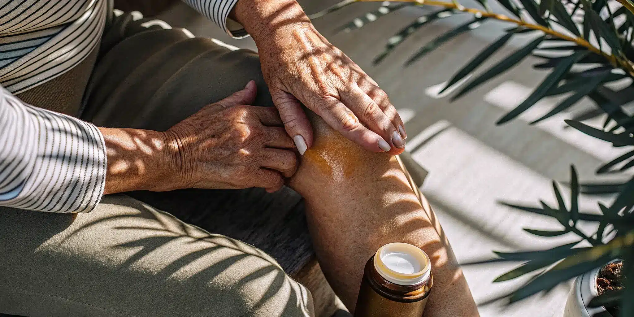 Person applying a topical analgesic for arthritis directly to their knee.