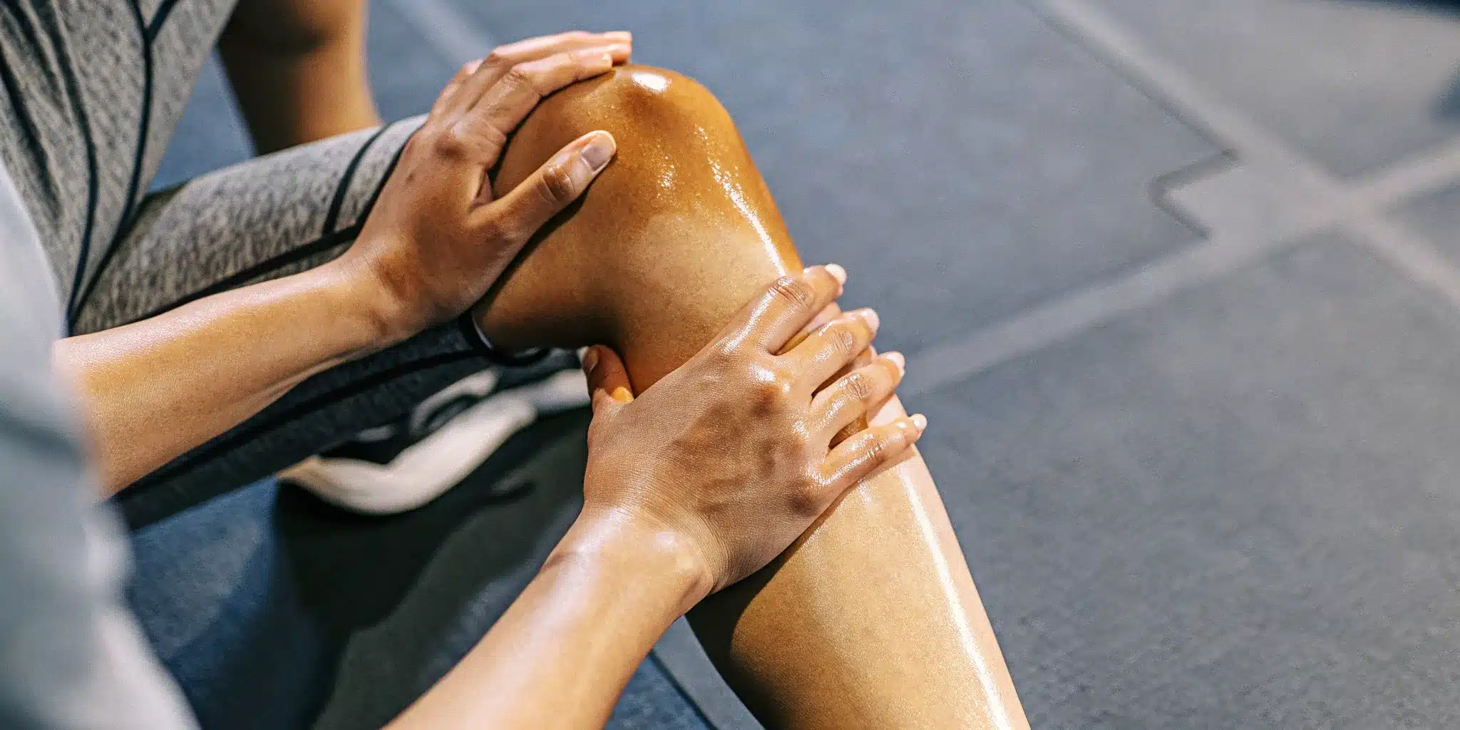 the-4-best-deep-muscle-rubs-for-athletes-979077 Deep muscle rub for athletes applied to a sore knee for post-workout recovery.